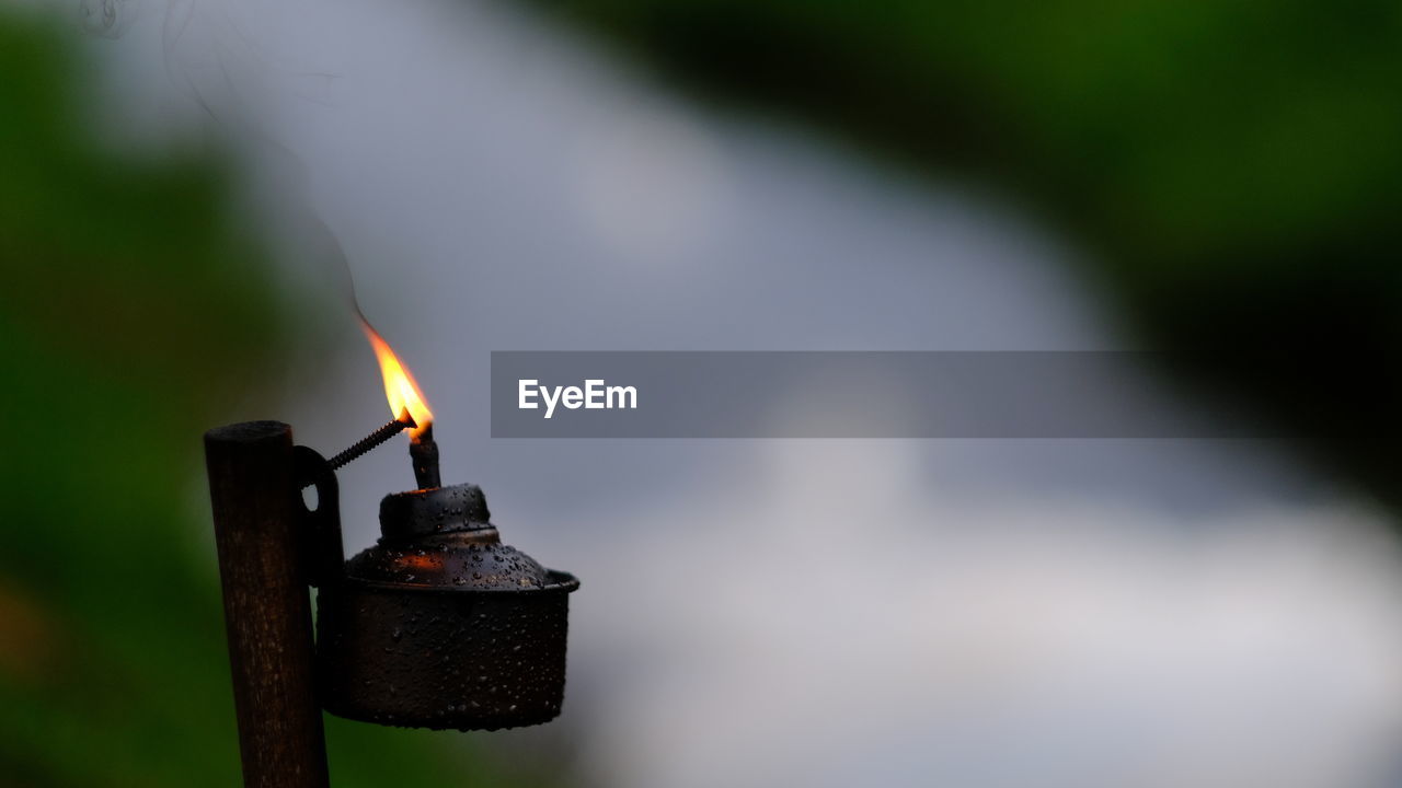 Close-up of burning kerosene lamp 