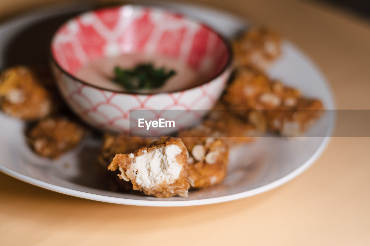 CLOSE-UP OF DESSERT ON TABLE