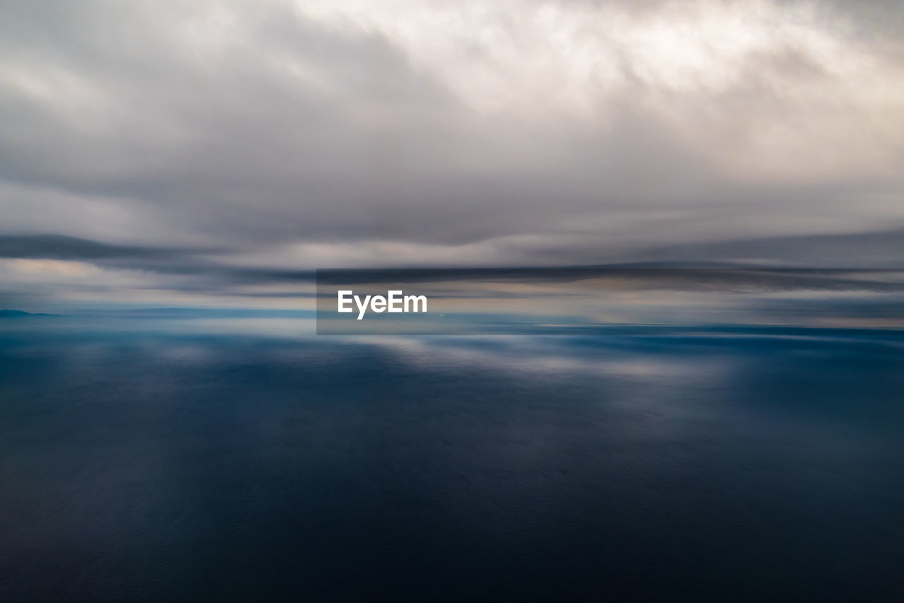 REFLECTION OF CLOUDS IN WATER