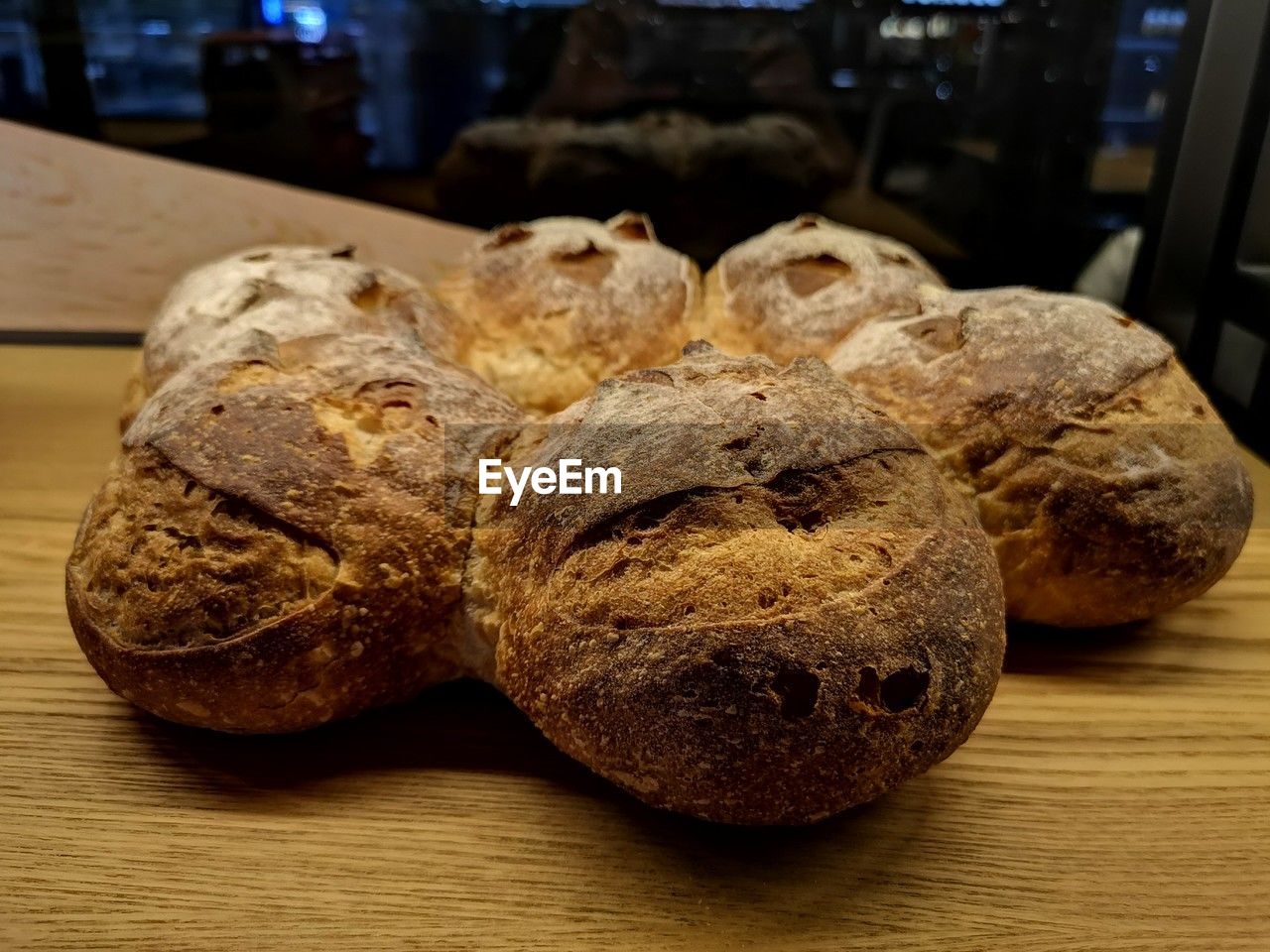 food and drink, freshness, food, bread, indoors, loaf of bread, wellbeing, store, table, close-up, healthy eating, rye bread, baked, wood, bakery, no people, sourdough, focus on foreground, brown, still life