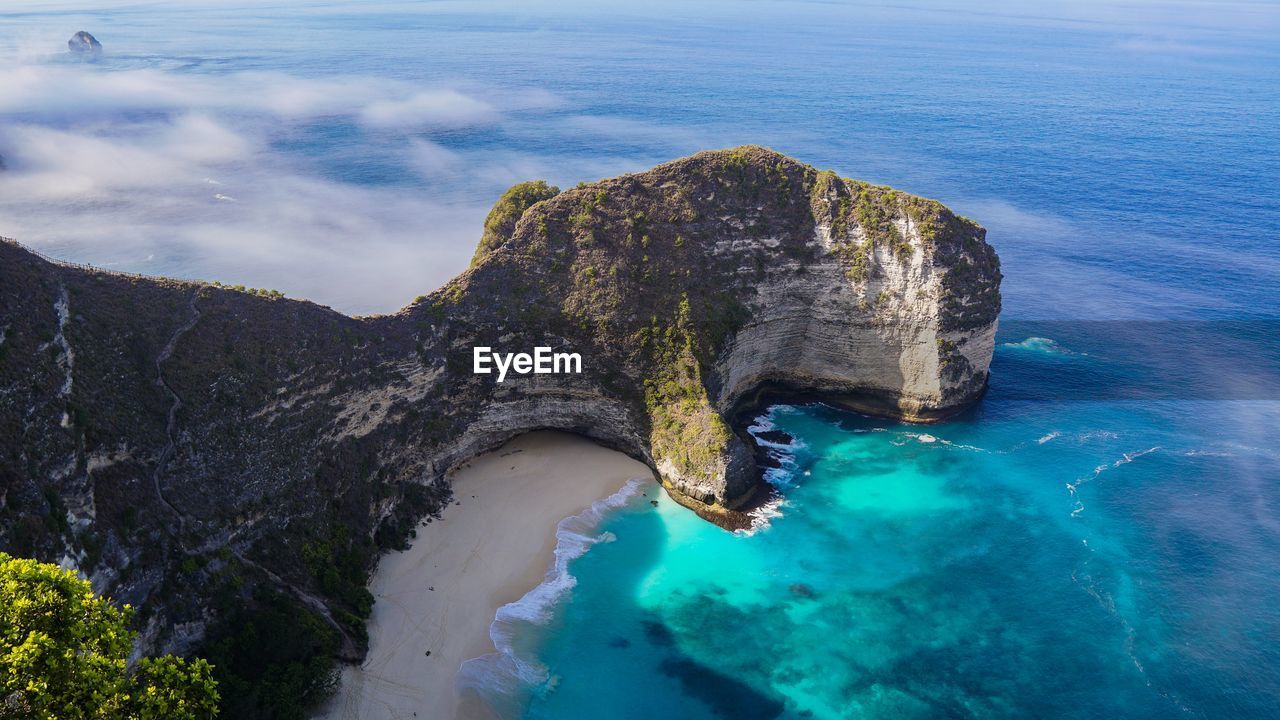 High angle view of rock formation in sea