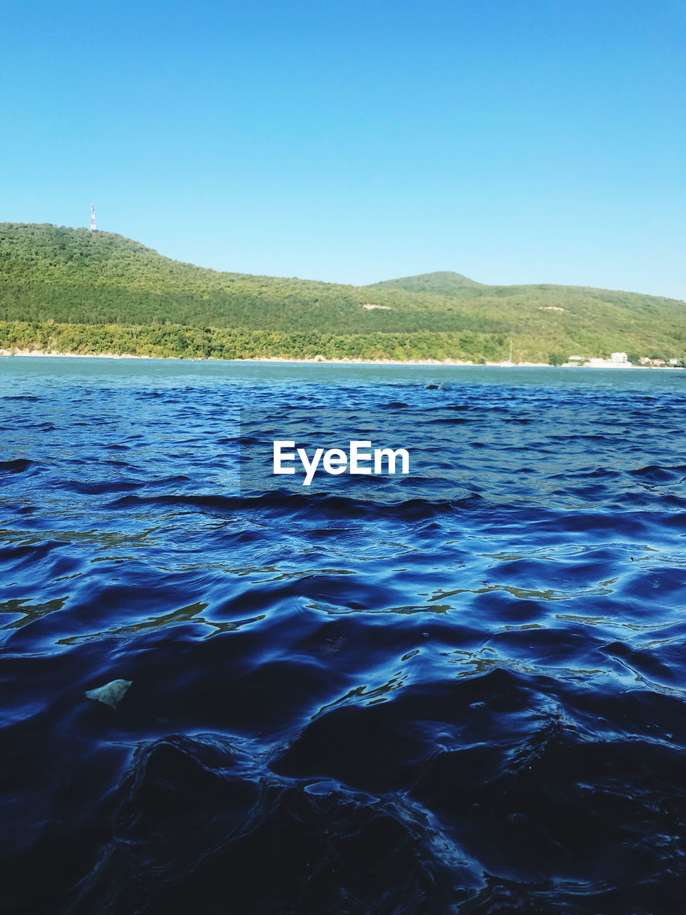 SCENIC VIEW OF SEA AGAINST BLUE SKY