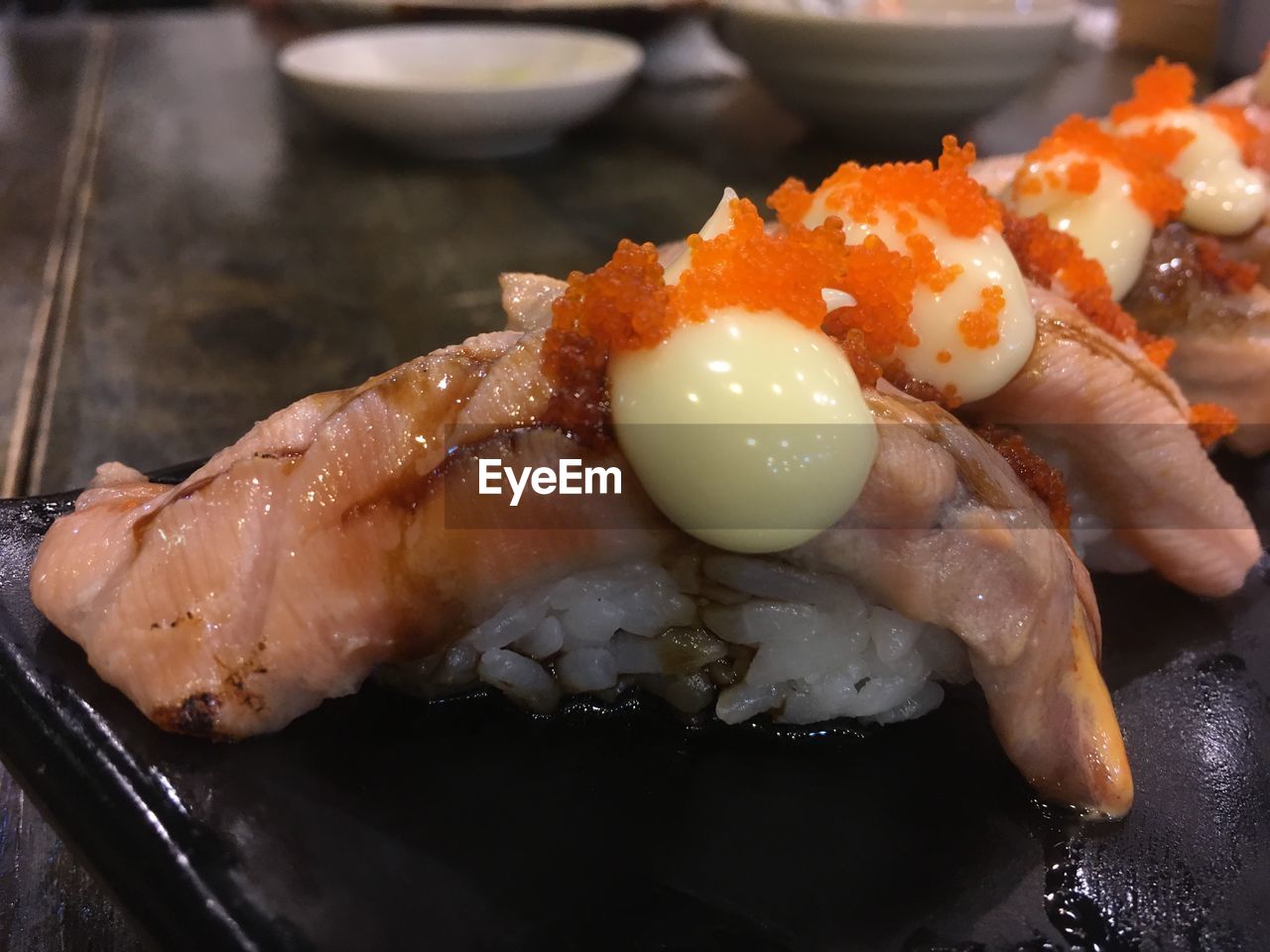 CLOSE-UP OF SUSHI ON PLATE