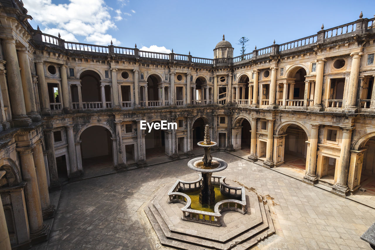 View of old building in city against clear sky