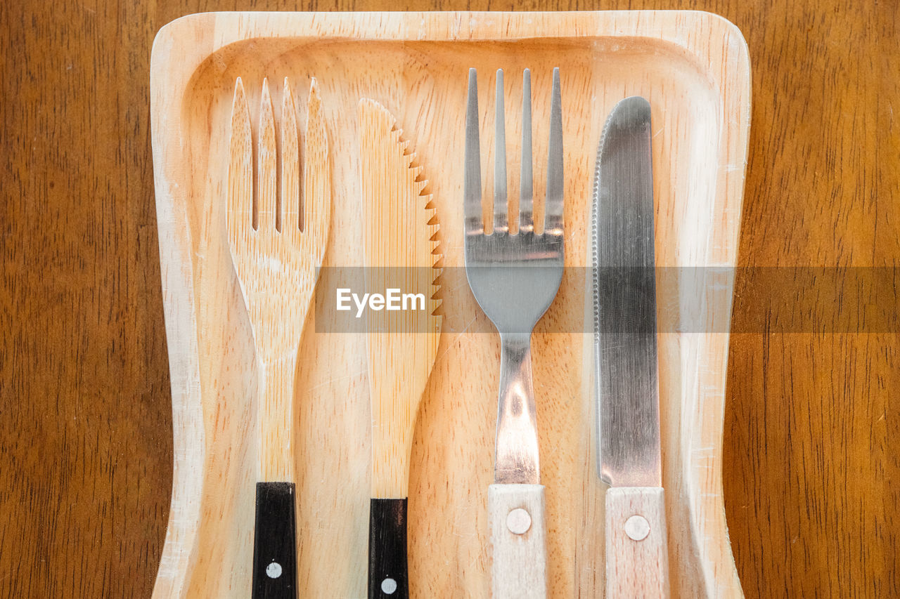 Close-up of eating utensils in tray