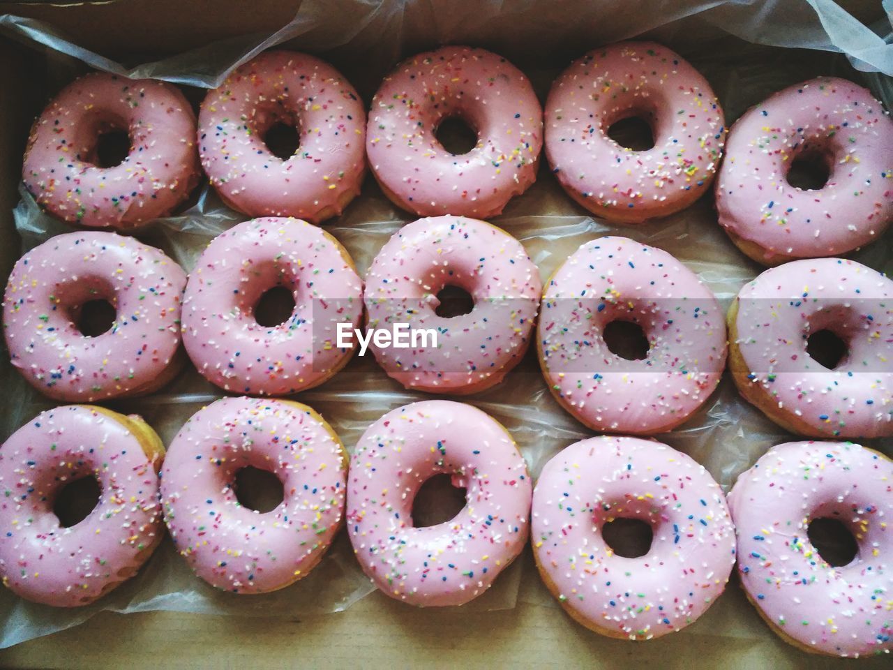 Directly above shot of donuts in box