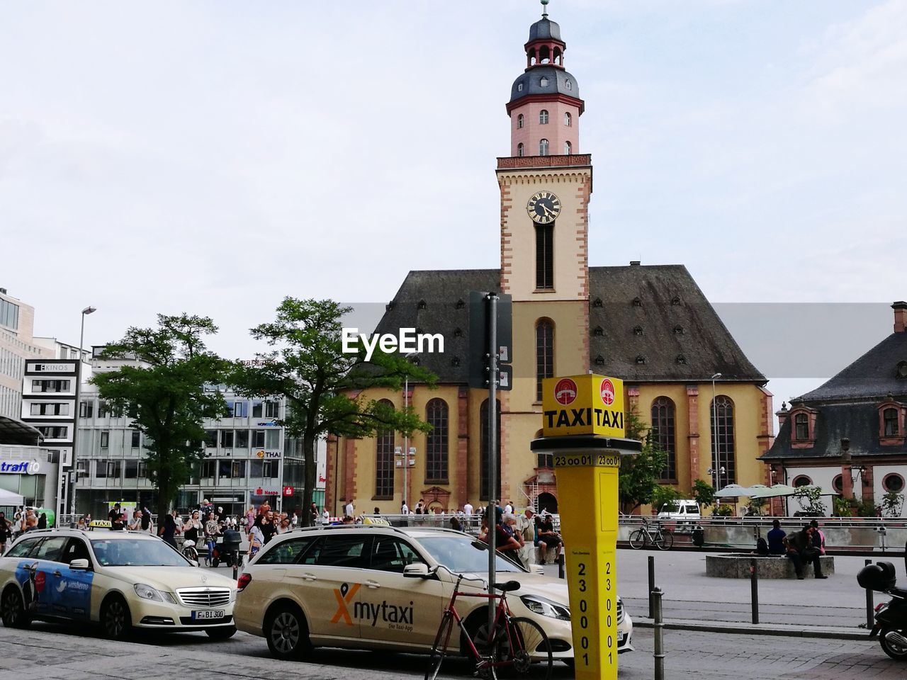 VIEW OF STREET AND BUILDINGS IN CITY