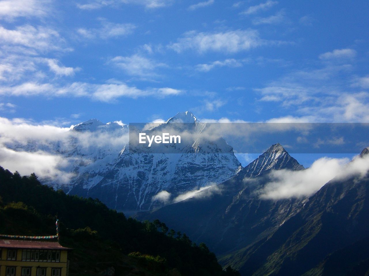 MOUNTAINS AGAINST SKY