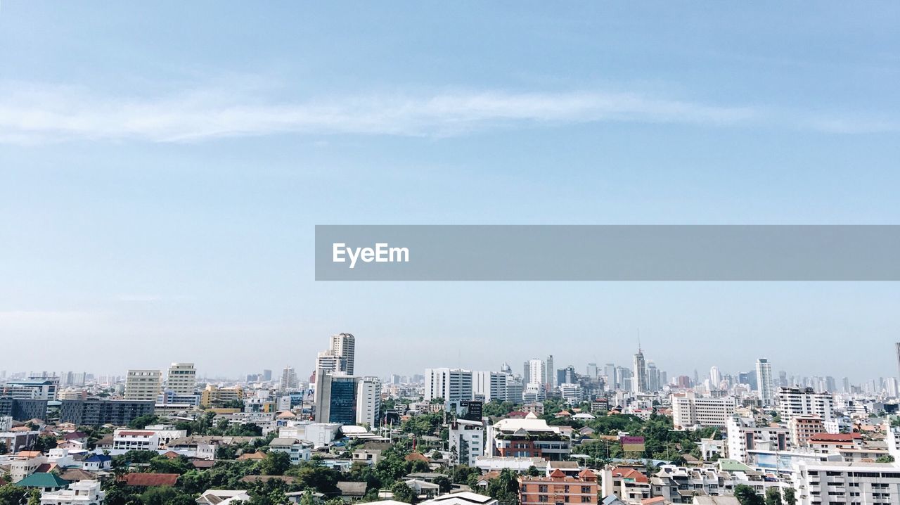 Scenic view of cityscape against sky