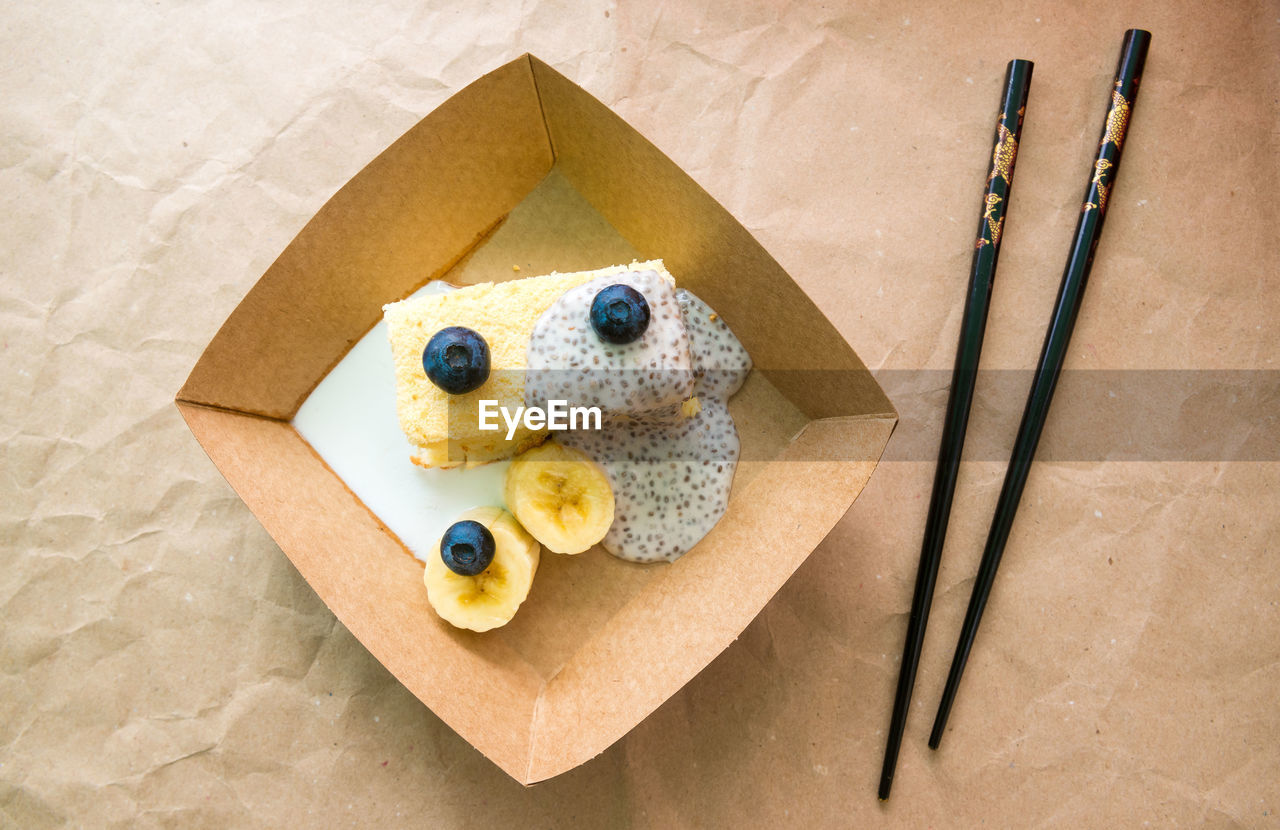 Castella japanese biscuit with blueberries and yogurt with chia seeds. a popular japanese dessert.