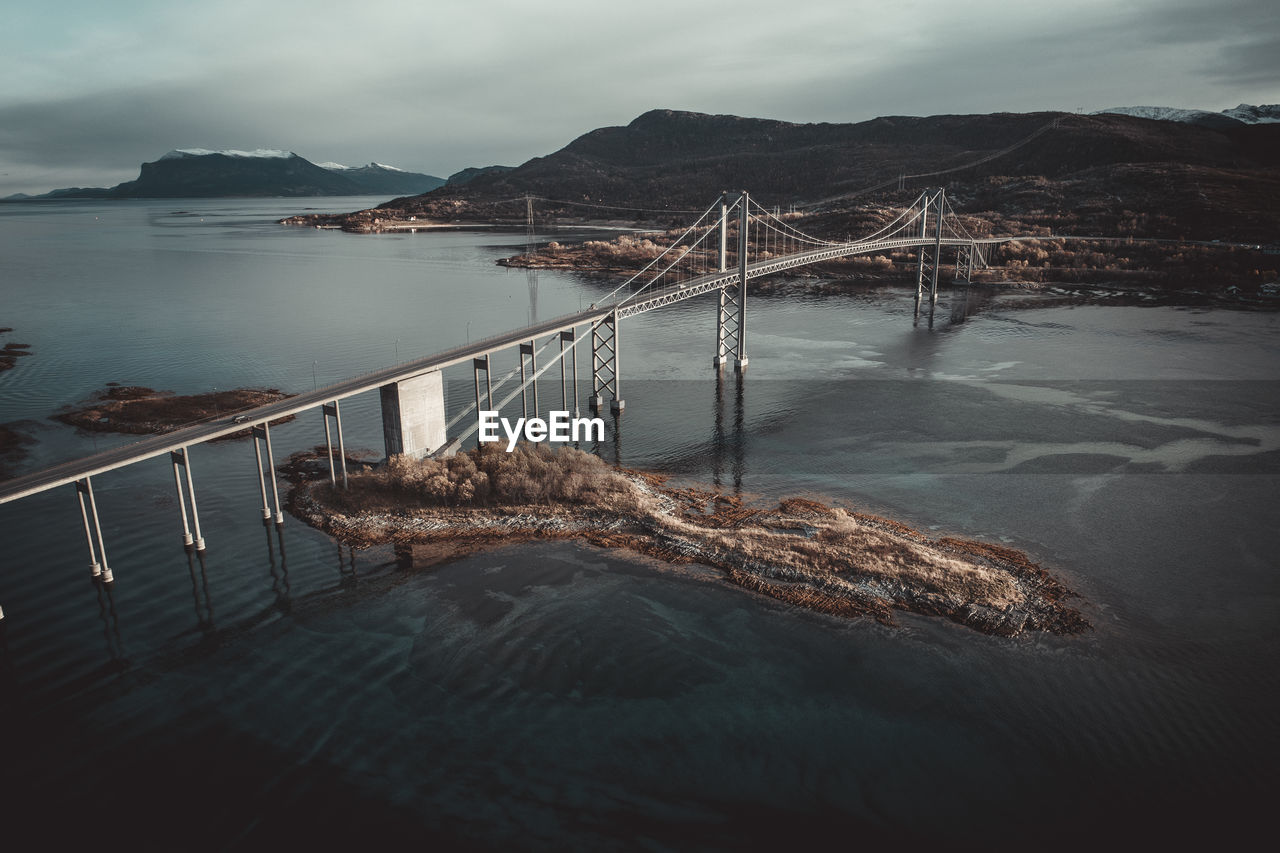 Bridge over norway fjords from aerial view