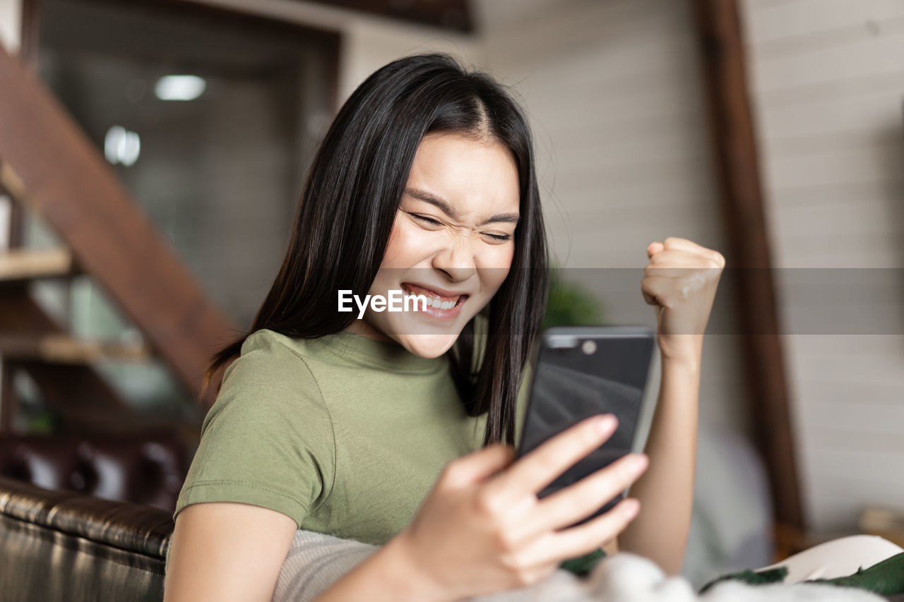 young woman using phone