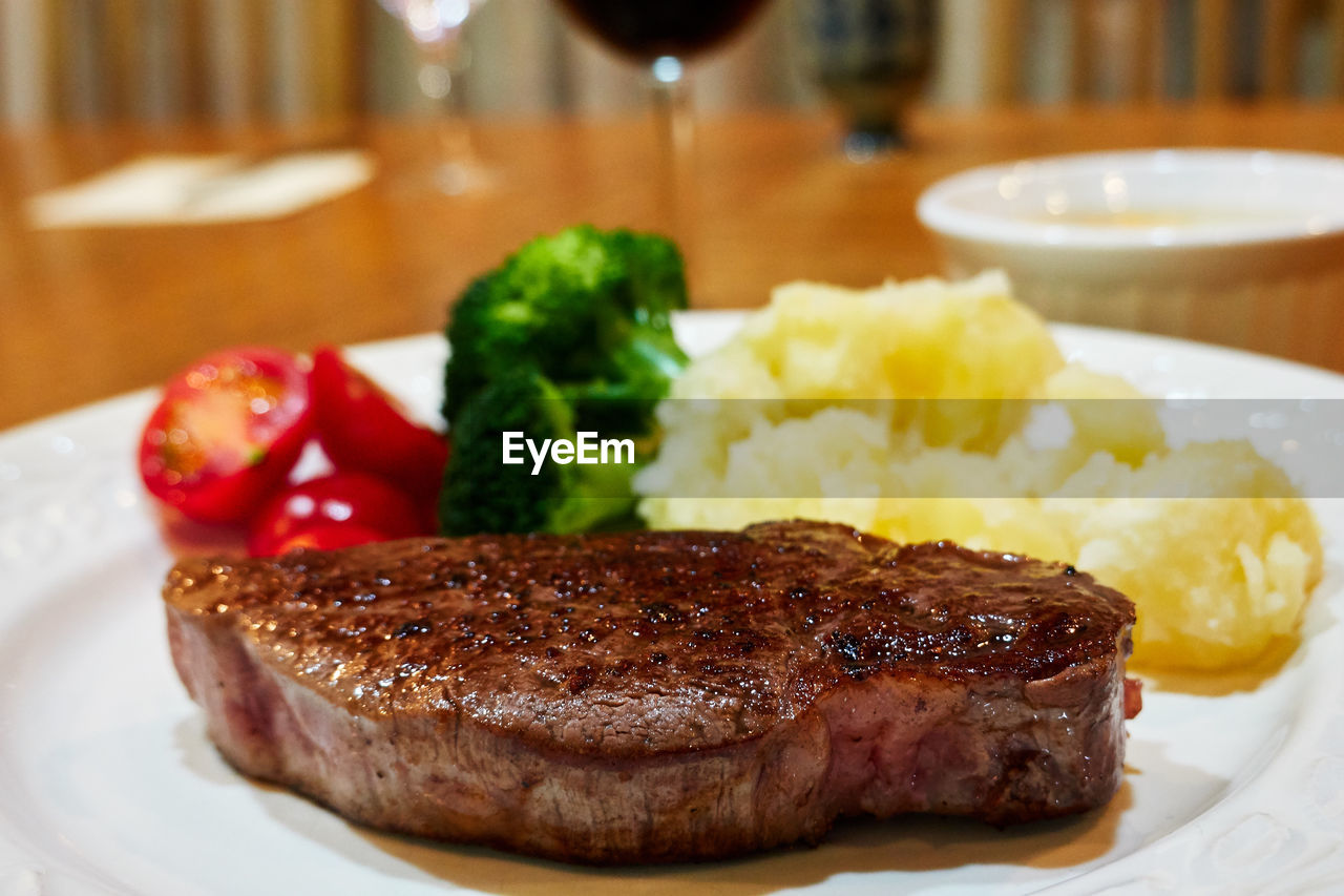 Close-up of homemade dinner steak meal served in plate