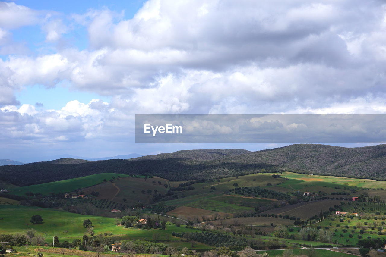 SCENIC VIEW OF FARM AGAINST SKY