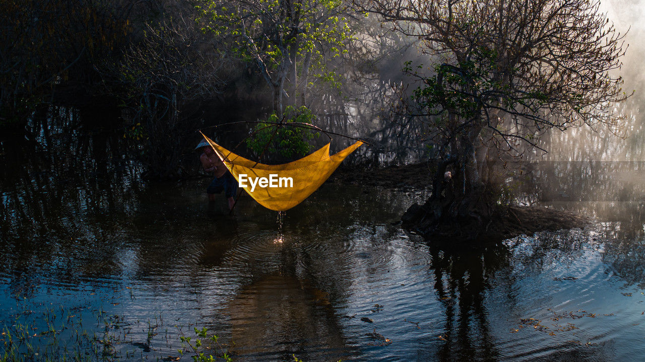 reflection, nature, water, morning, tree, leaf, plant, autumn, river, sunlight, no people, nautical vessel, outdoors, beauty in nature, wilderness, tranquility, boat, vehicle, yellow, environment, day, scenics - nature, forest