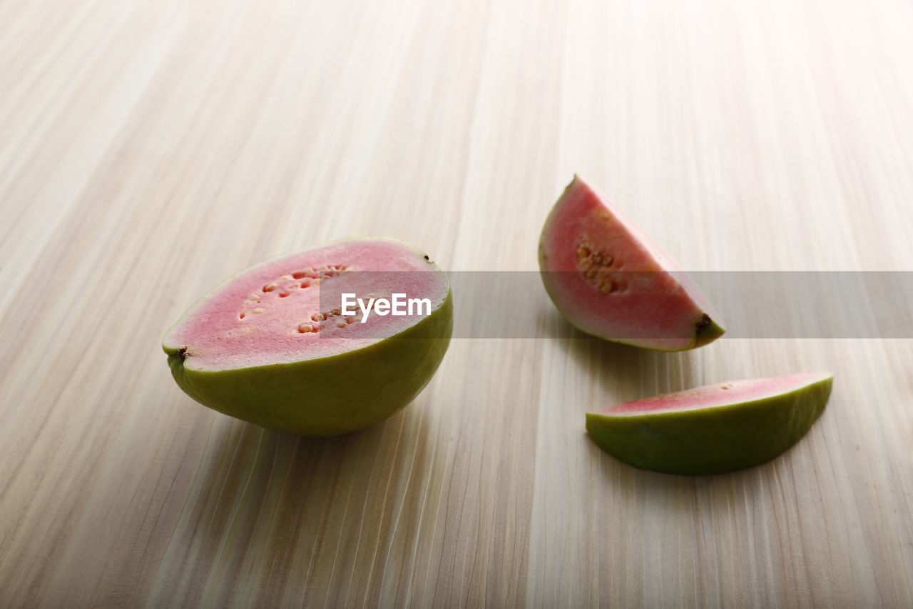 CLOSE-UP OF FRUIT ON TABLE