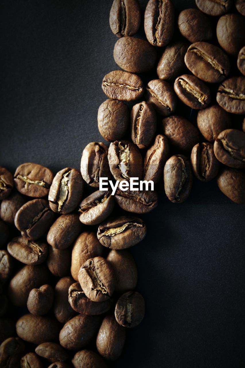 Close-up of coffee beans on table