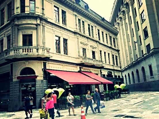 PEOPLE WALKING ON CITY STREET