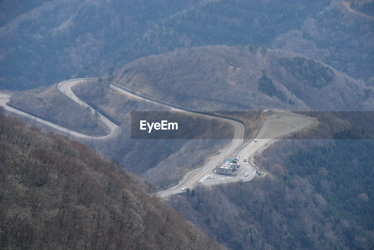 High angle view of road amidst mountains