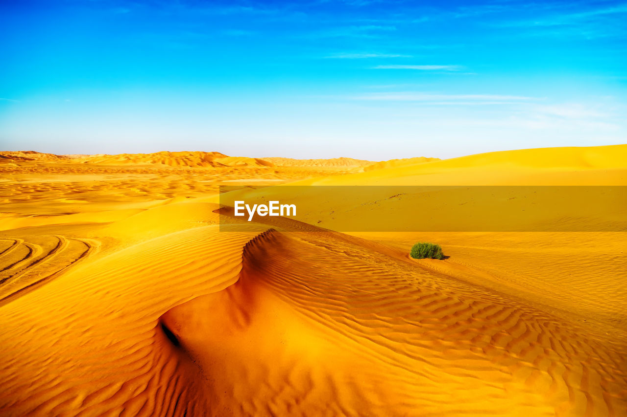 Scenic view of desert against sky