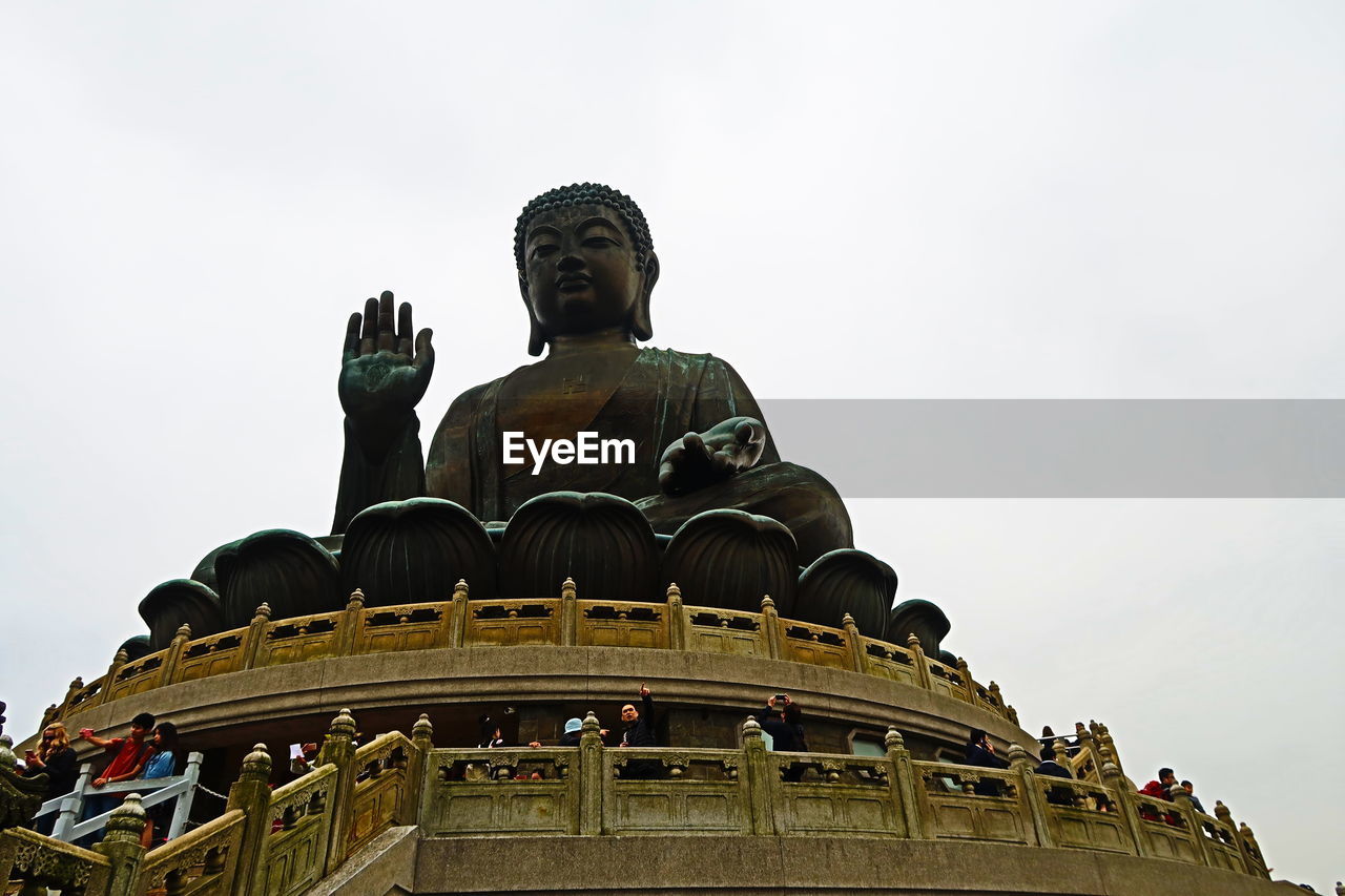 LOW ANGLE VIEW OF STATUE OF TEMPLE