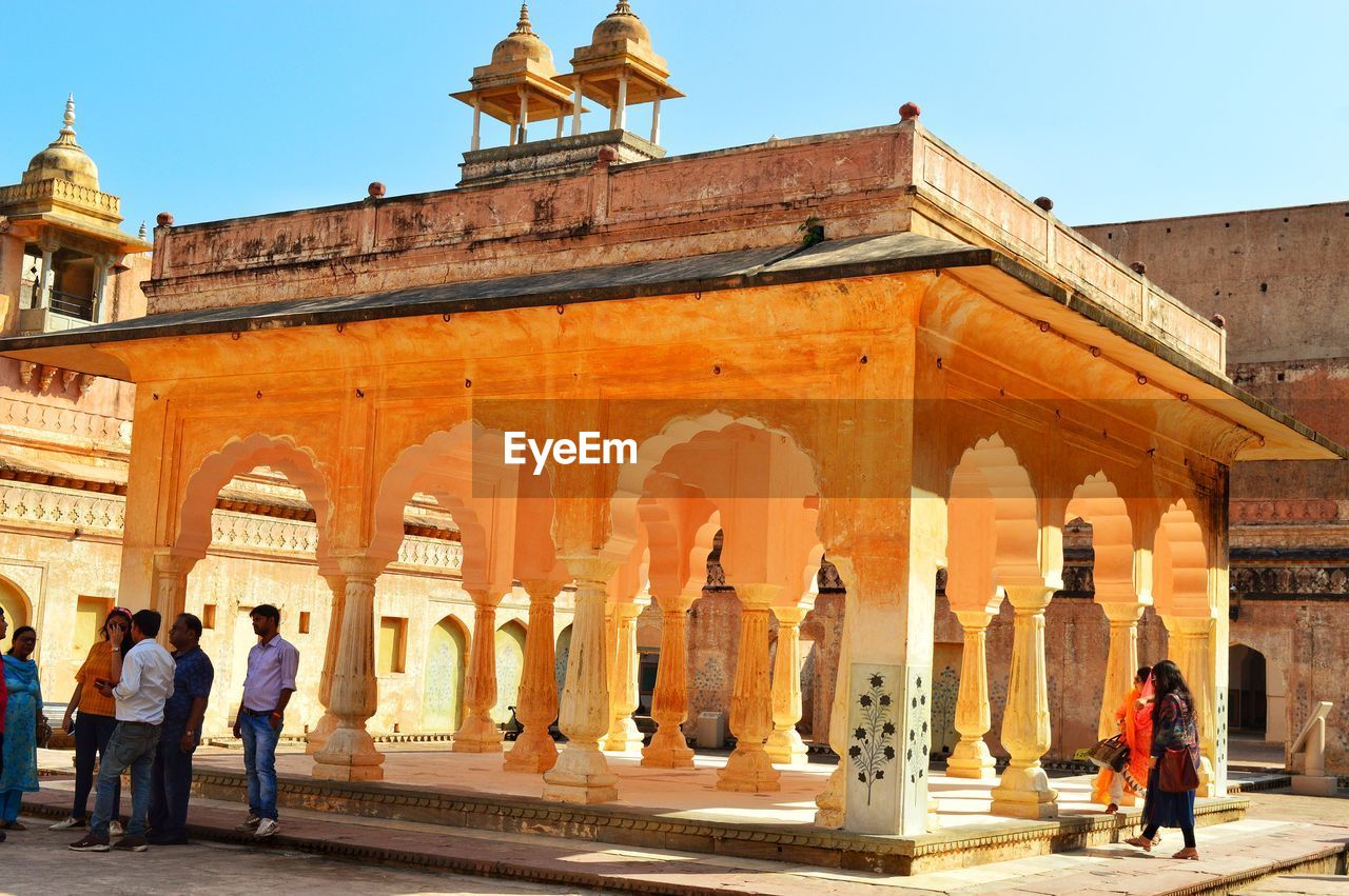 TOURISTS AT HISTORICAL BUILDING