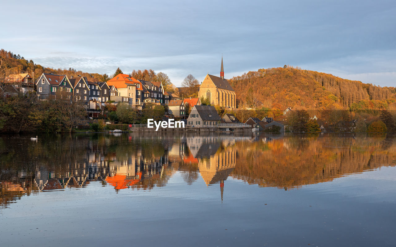 Beyenburg lake with water reflection and autumnal colors, wuppertal, bergisches land, germany