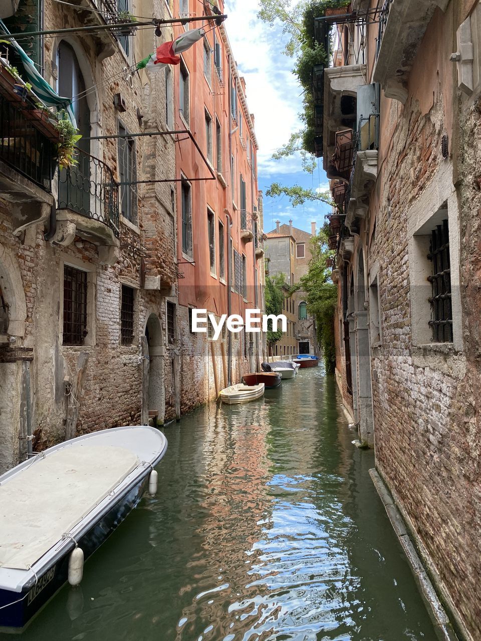 View of buildings along a canal in venice