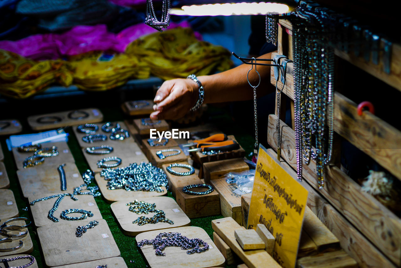 Cropped hand of person at market stall