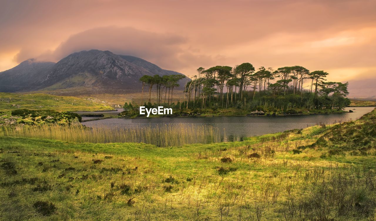 Landscape scenery, twelve pines island and mountains in the background at derryclare galway, ireland