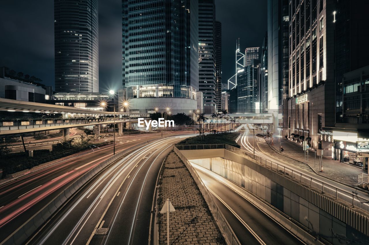 High angle view of light trails on city at night