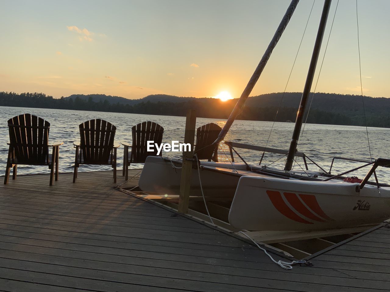 SCENIC VIEW OF SEA AGAINST SKY AT SUNSET