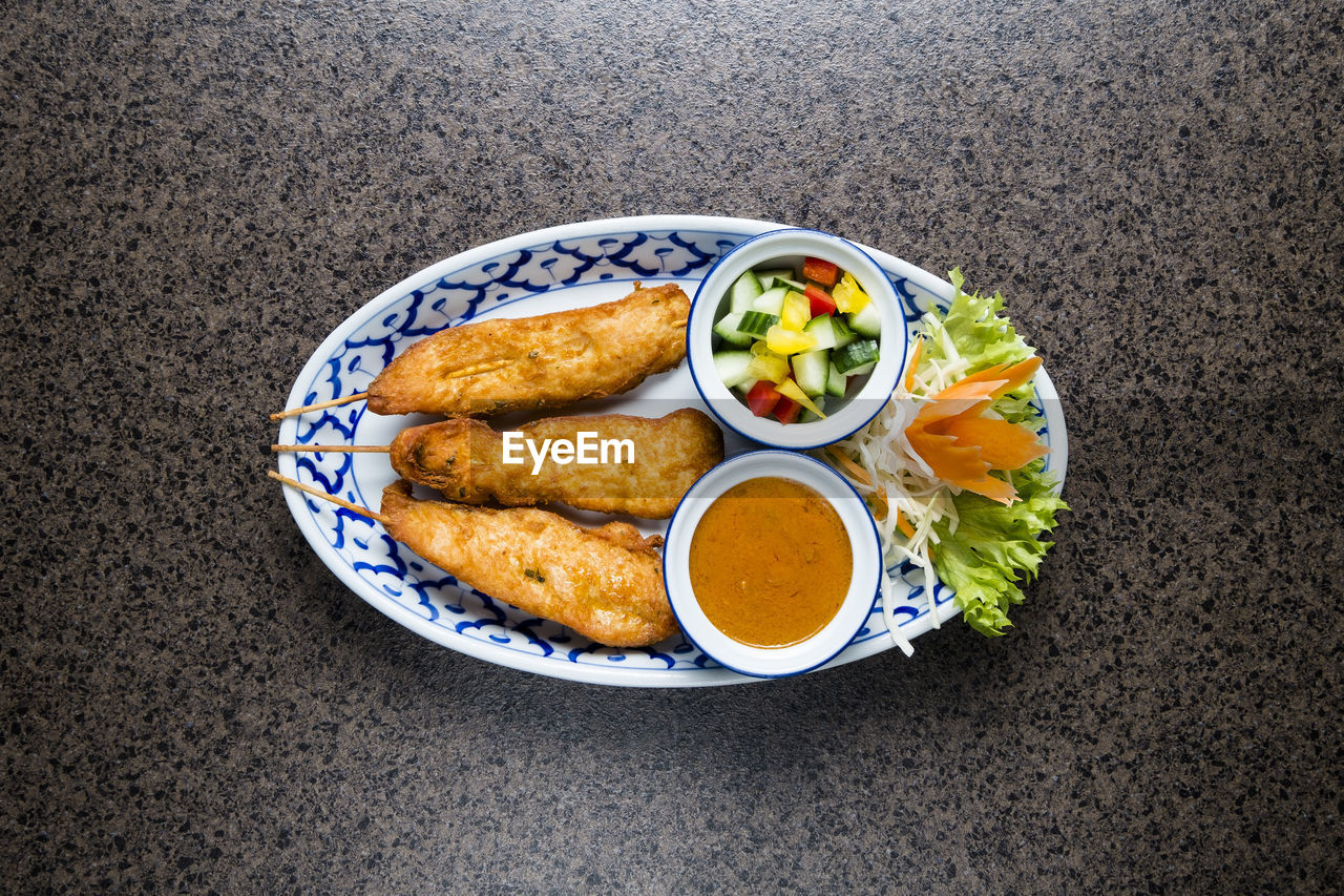 Directly above shot of food served on table