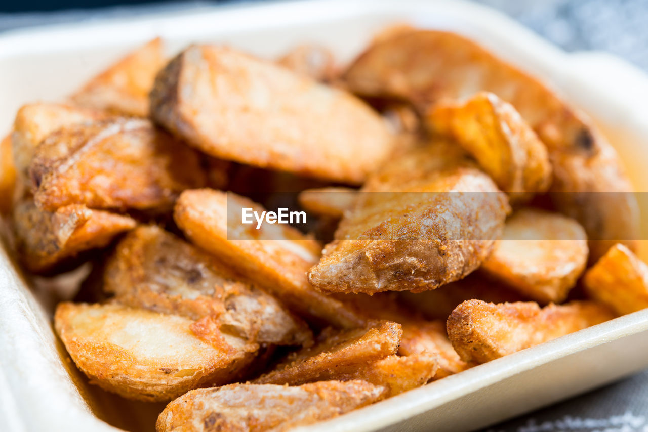 Close-up of fried potatoes in plate