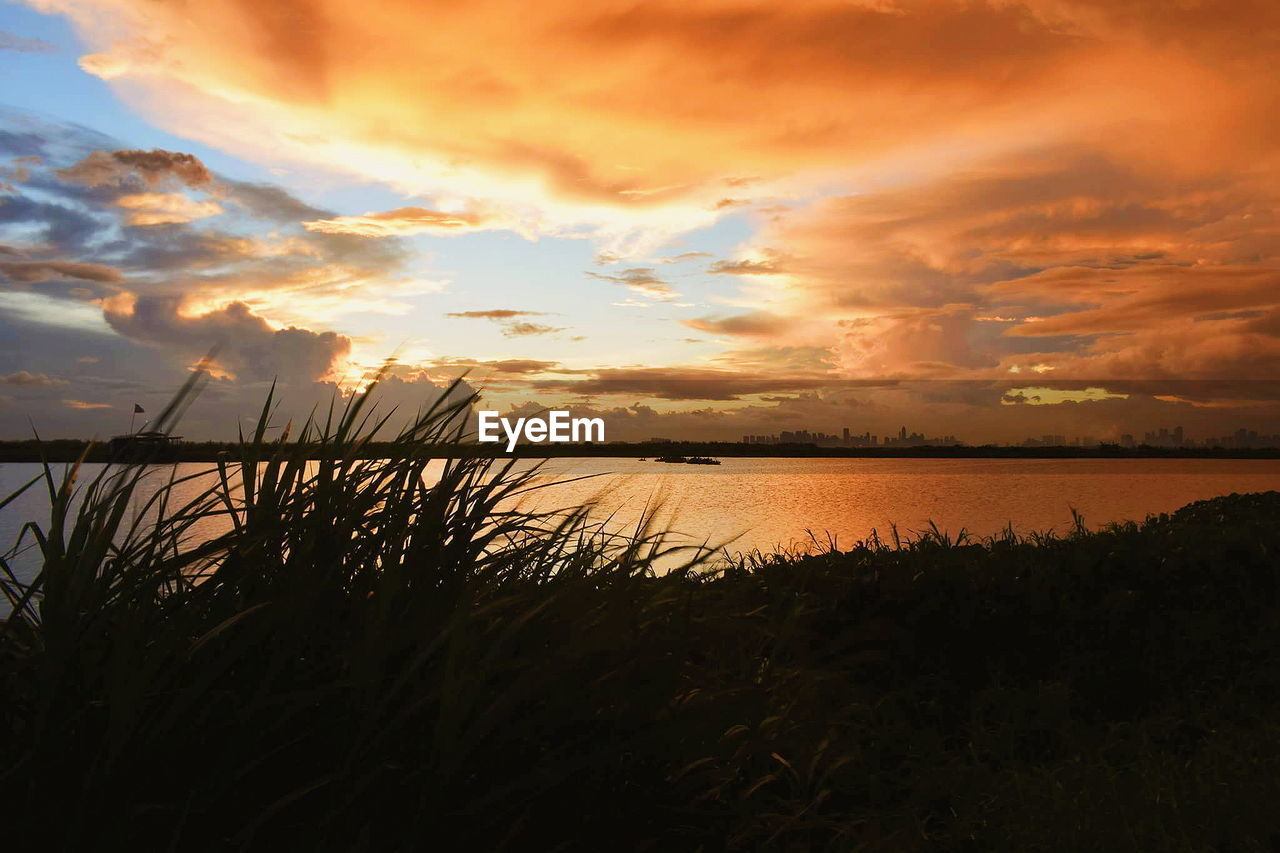 Scenic view of sea against sky during sunset