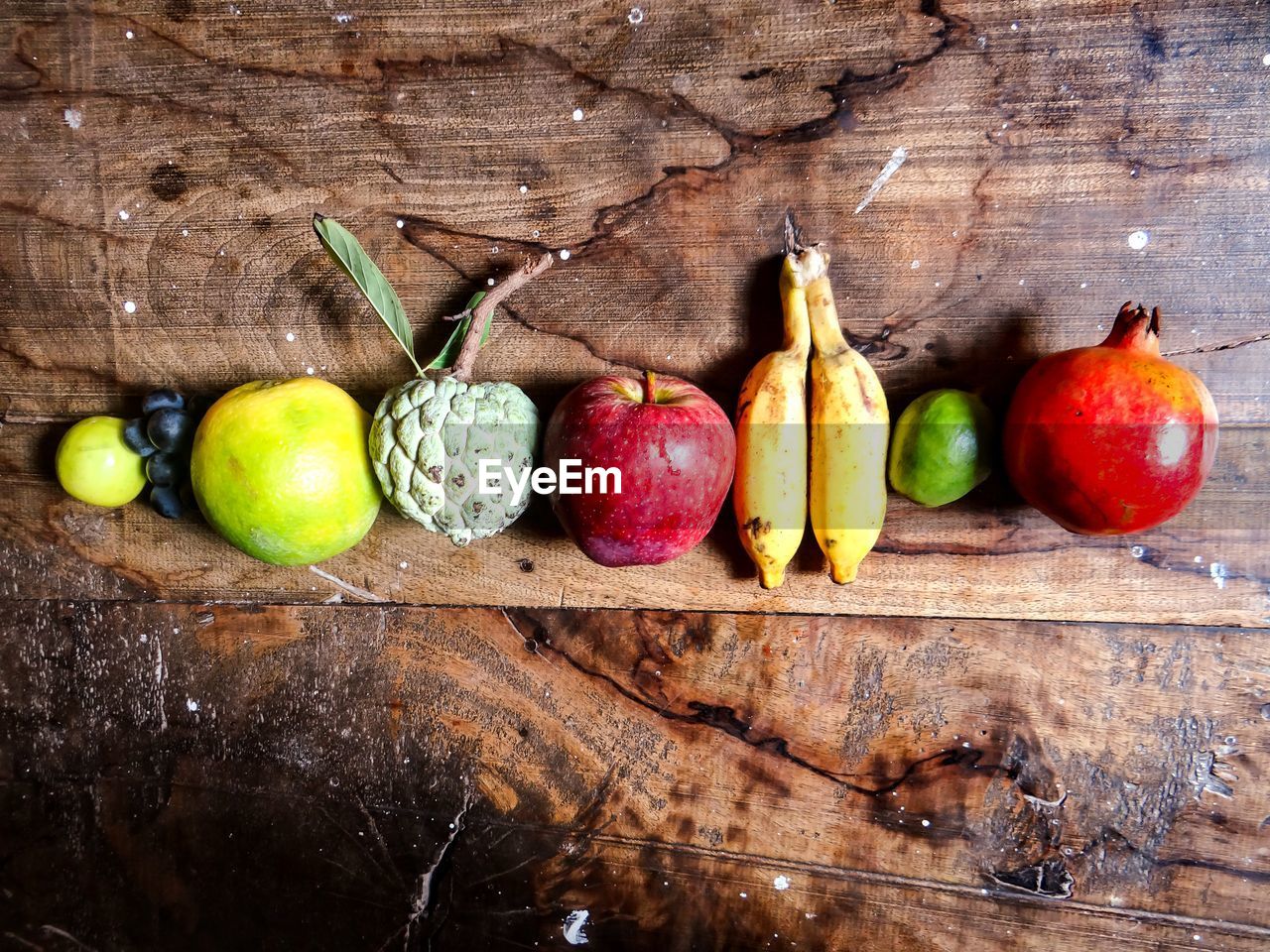 Directly above view of various fruits on table