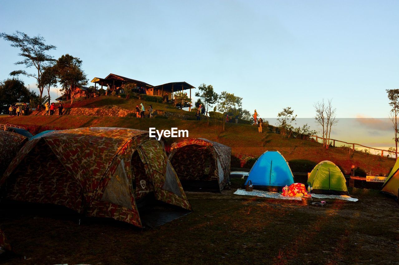 VIEW OF TENT IN PARK AGAINST SKY