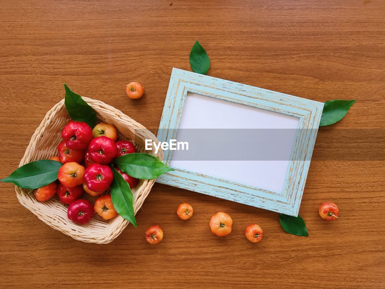 HIGH ANGLE VIEW OF FRUITS IN PLATE ON TABLE