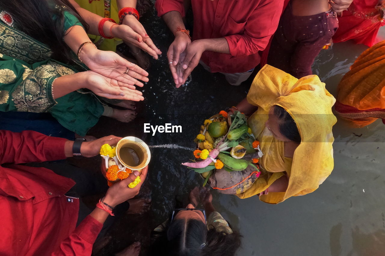 Colors of rituals. people are doing their rituals during chhath puja festival in kolkata, india.