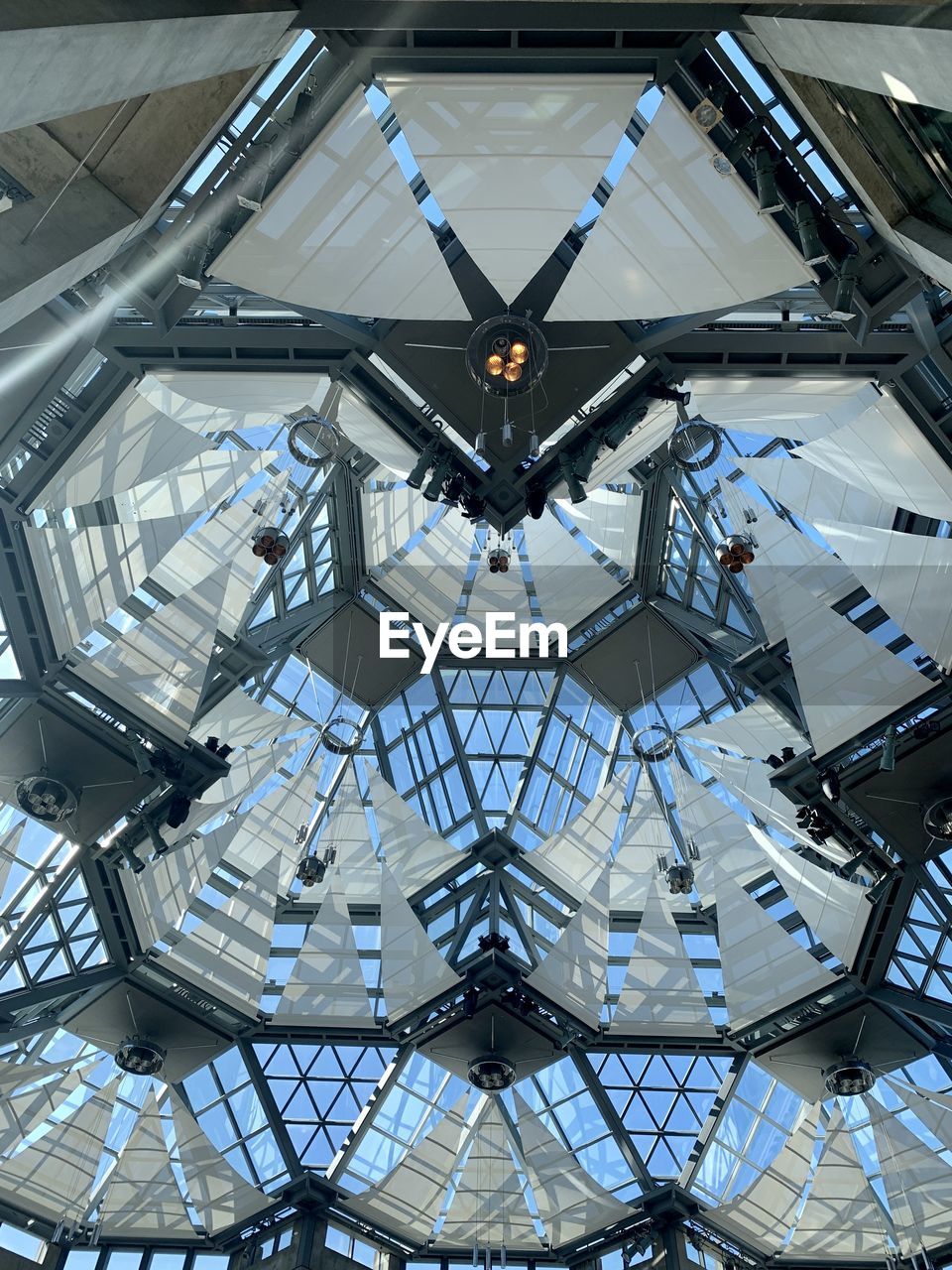 architecture, built structure, ceiling, indoors, low angle view, pattern, no people, dome, daylighting, directly below, glass, shape, skylight, metal, geometric shape