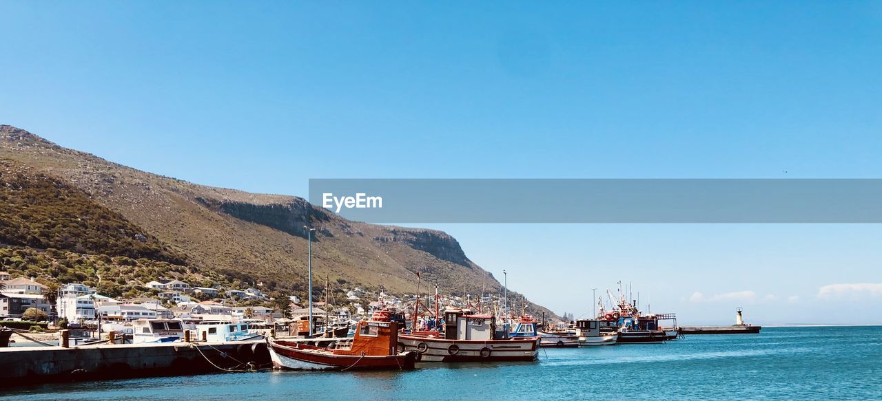 Boats in kalkbay harbour, cape town south africa