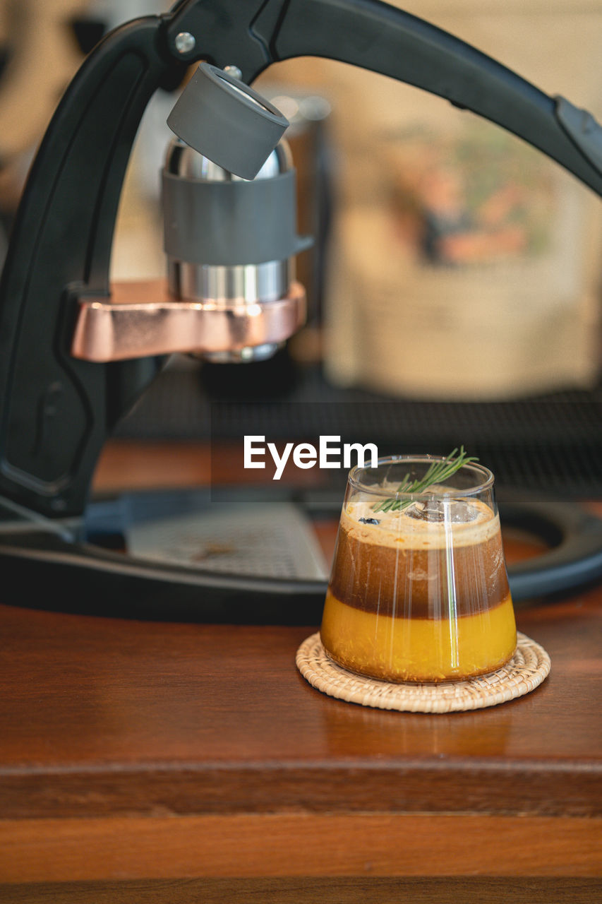 food and drink, food, drink, indoors, focus on foreground, lighting, freshness, coffee, no people, refreshment, table, business, coffeemaker, wood, close-up