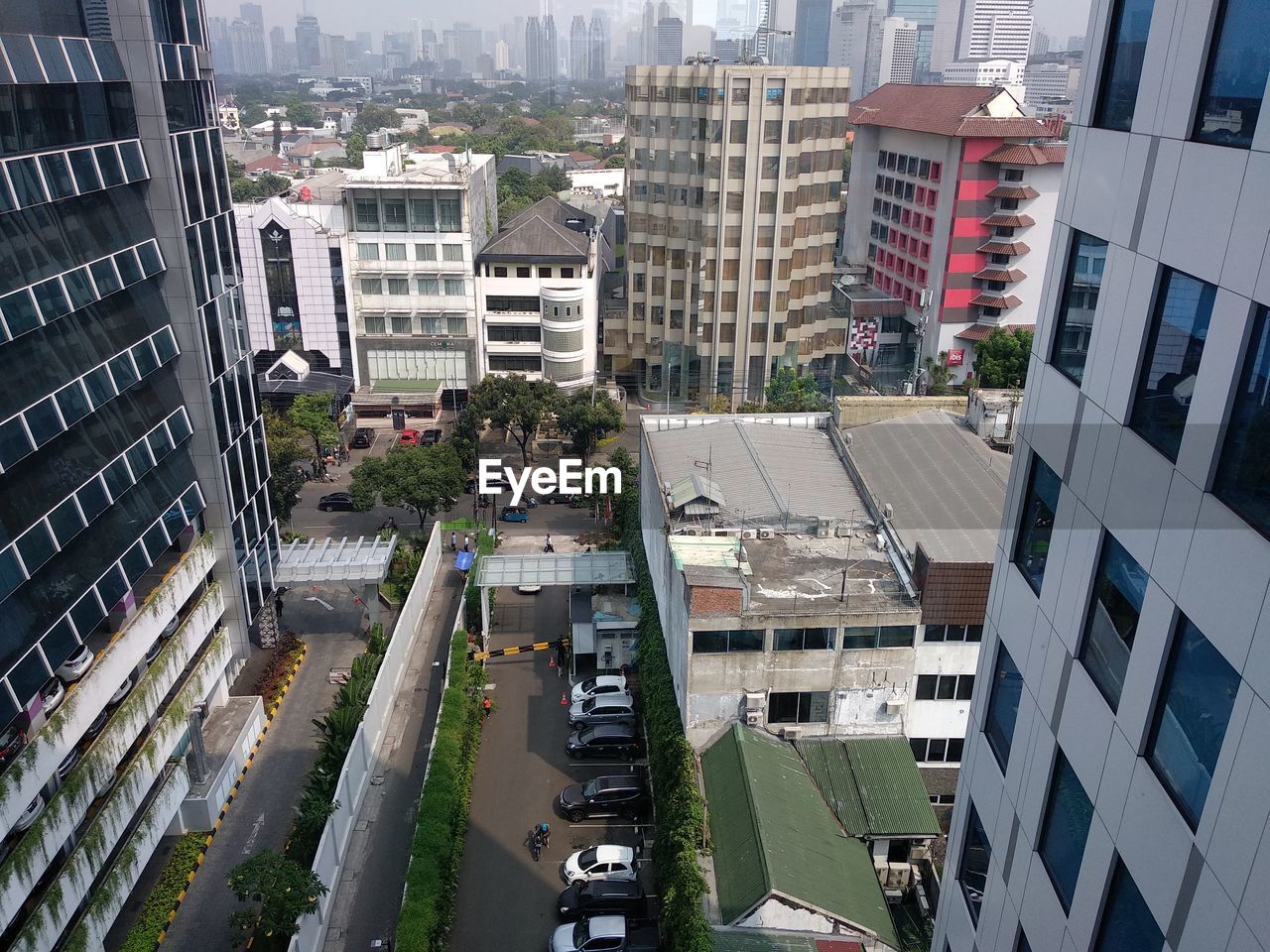 High angle view of street amidst buildings in city