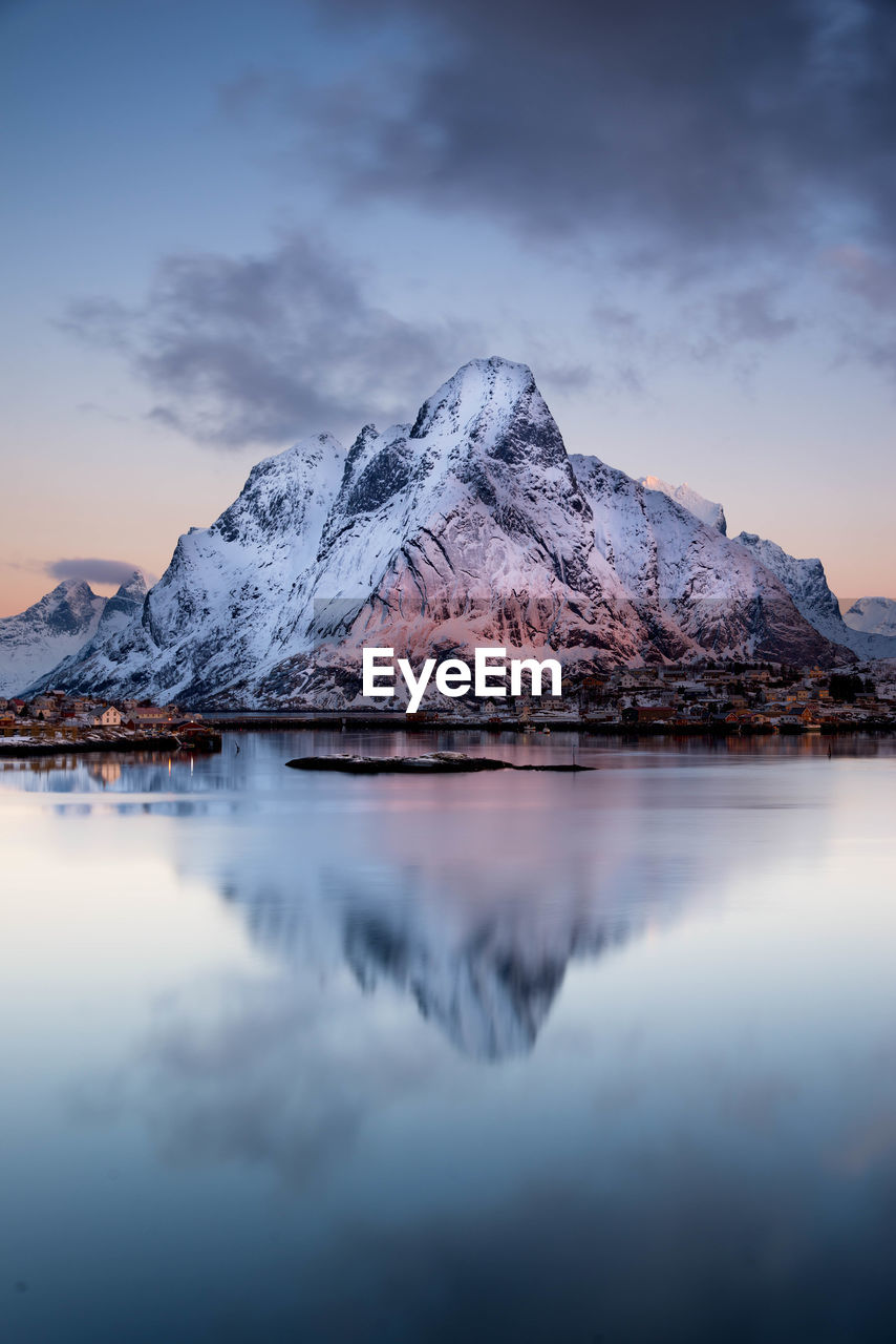 Scenic view of lake with mountains in background