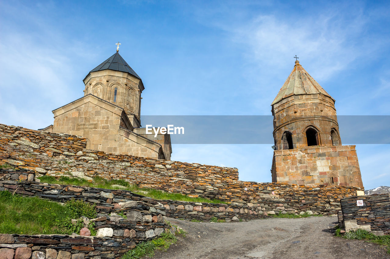 LOW ANGLE VIEW OF OLD CATHEDRAL AGAINST SKY