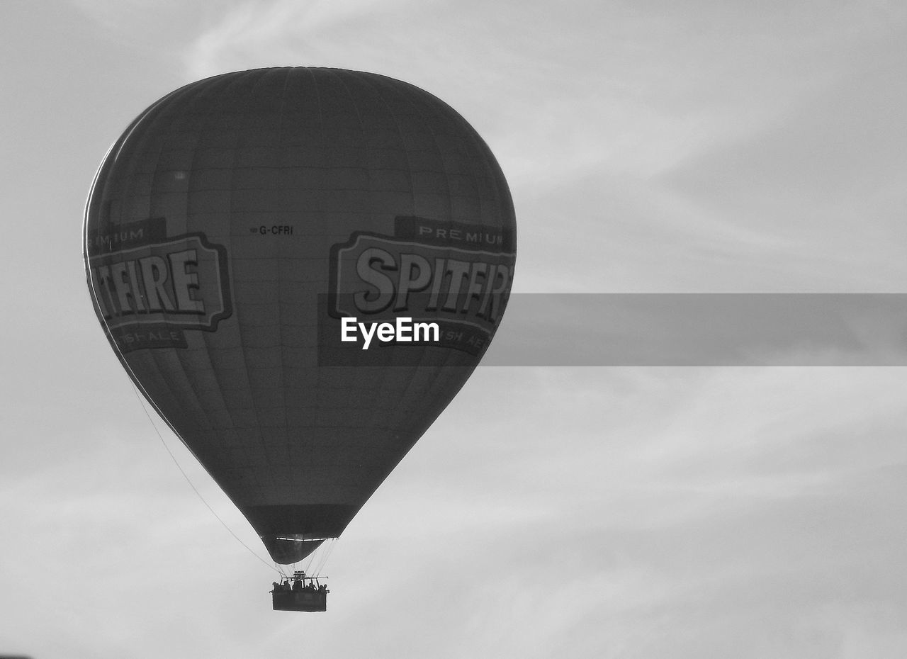 LOW ANGLE VIEW OF HOT AIR AGAINST SKY