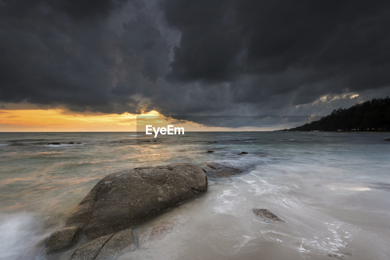 Scenic view of sea against sky during sunset