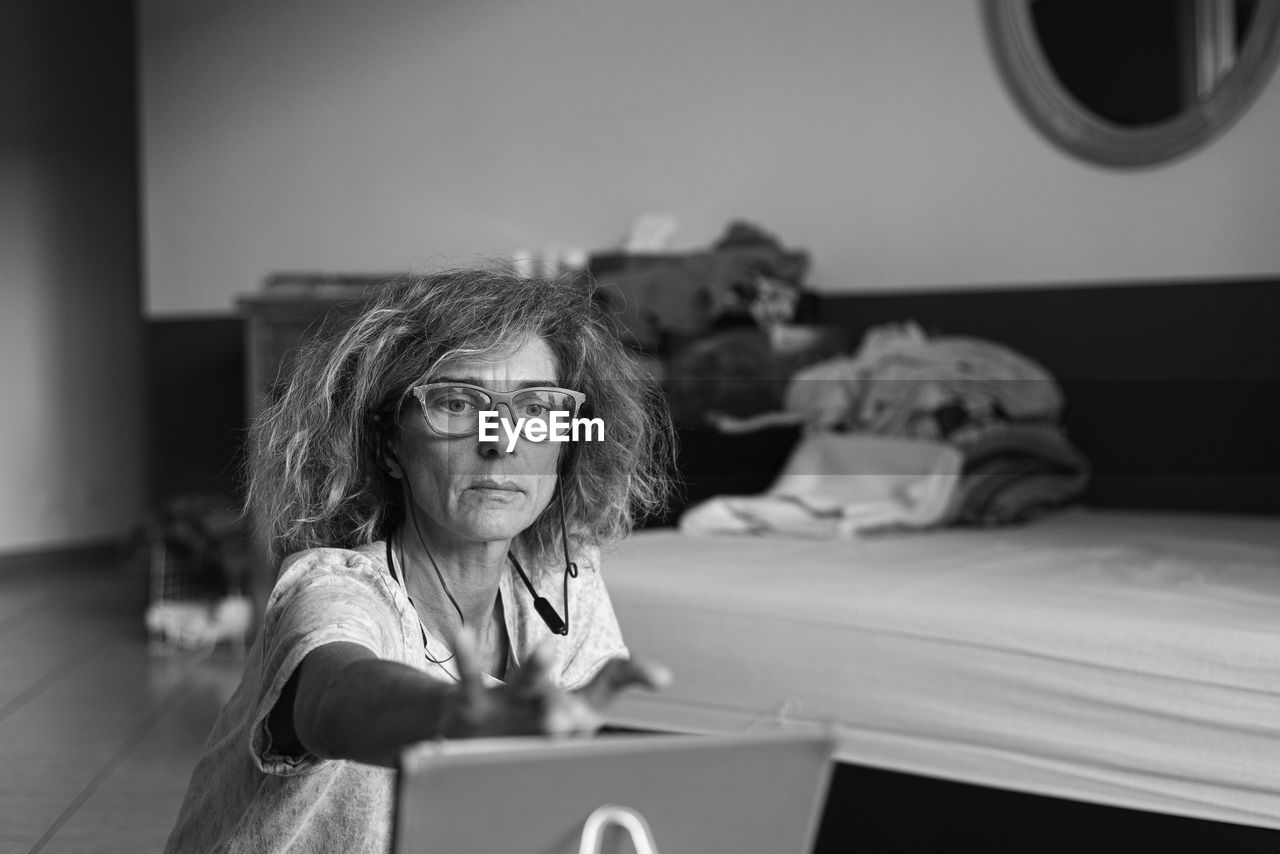 Woman using laptop at home