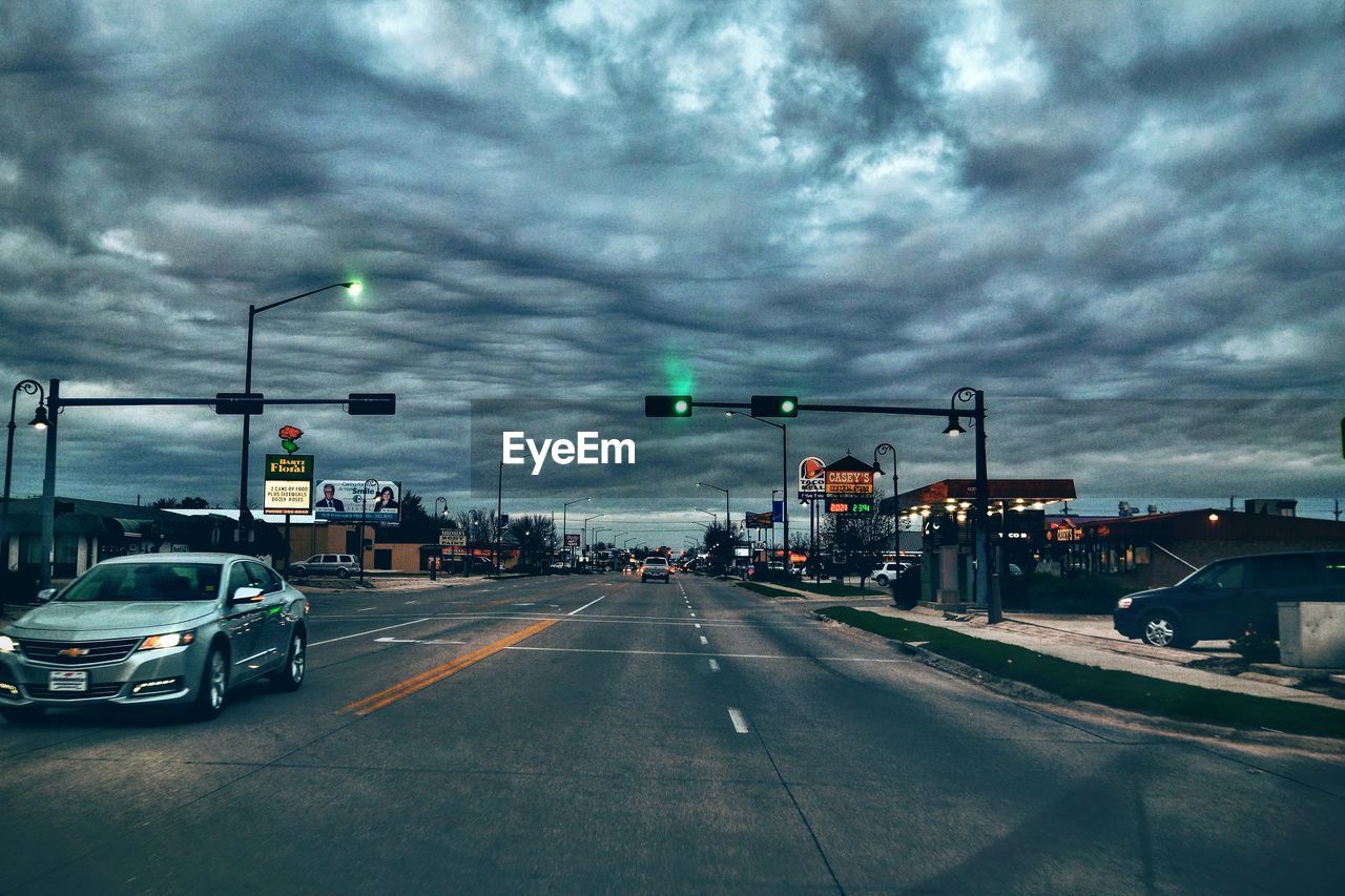 View of road against cloudy sky