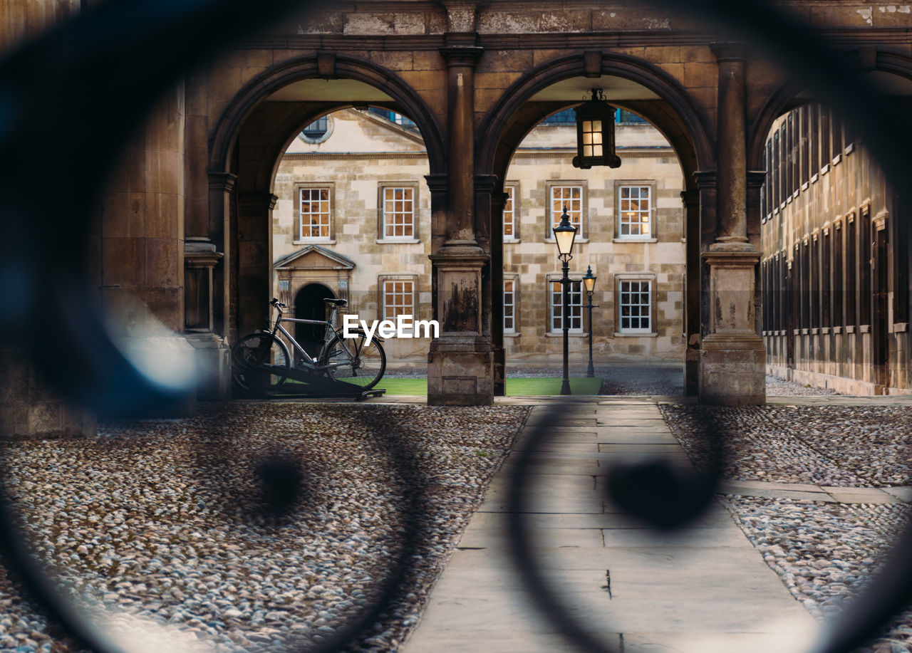 View of peterhouse cambridge through the college gate